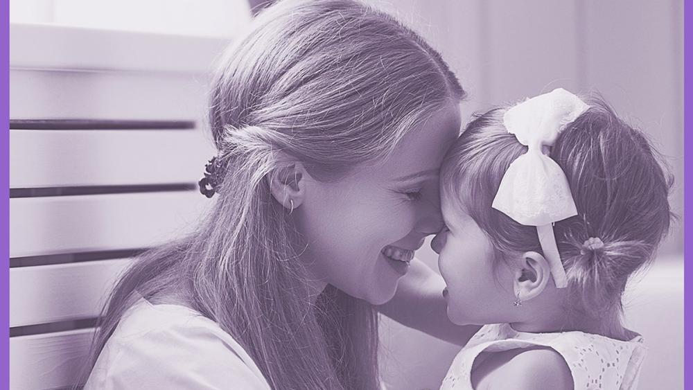 Mom and Little girl hugging 