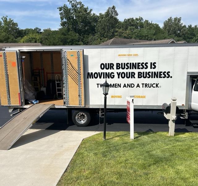 Two Men and a Truck back doors open