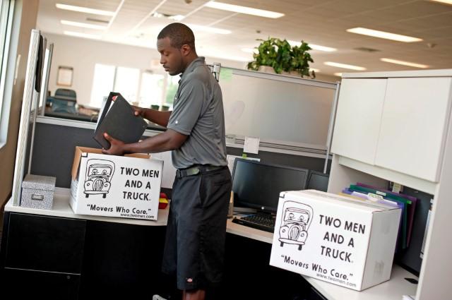 mover packing a box